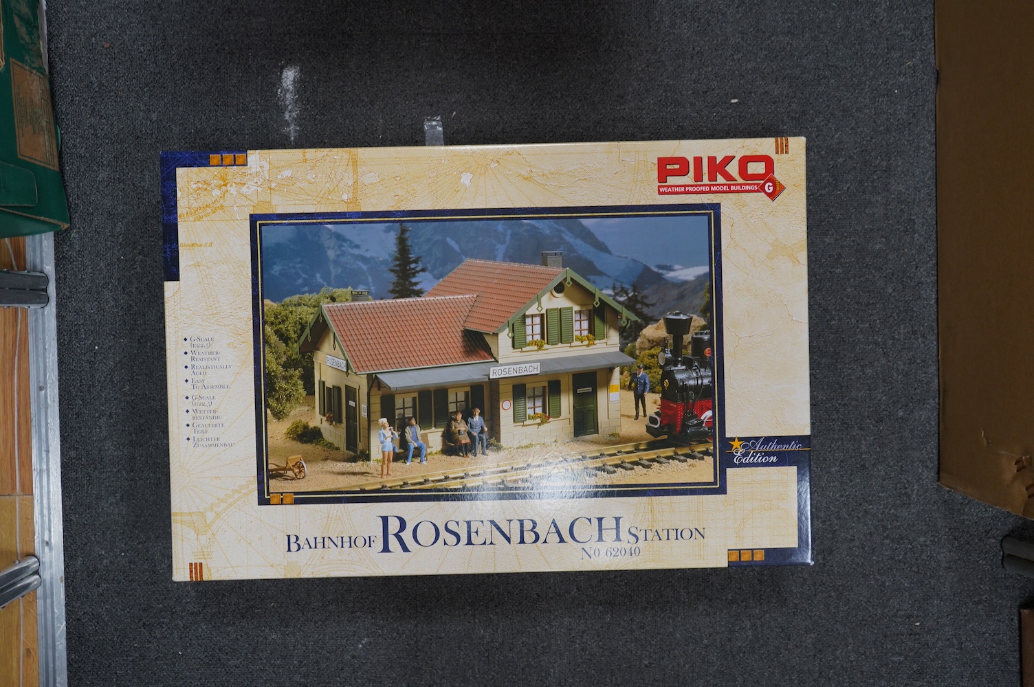 A collection of boxed Lehmann LGB and Piko G scale items including; a Piko Bahnhof Rosenbach Station (62040), a box of curved track sections (1600), a Hauptsignal (5092), Vorsignal (5091), level crossing (5065), driving